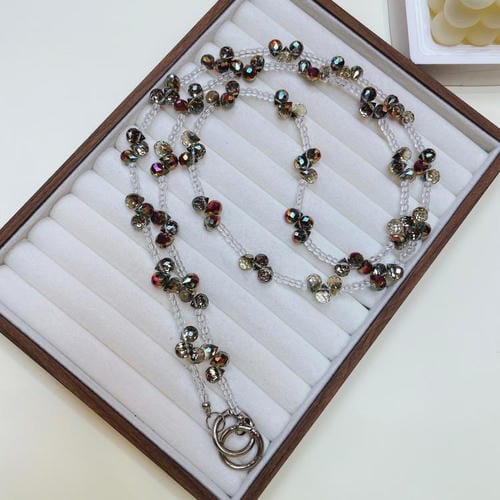 Cadena de teléfono con cristales en forma de gota (color caramelo)