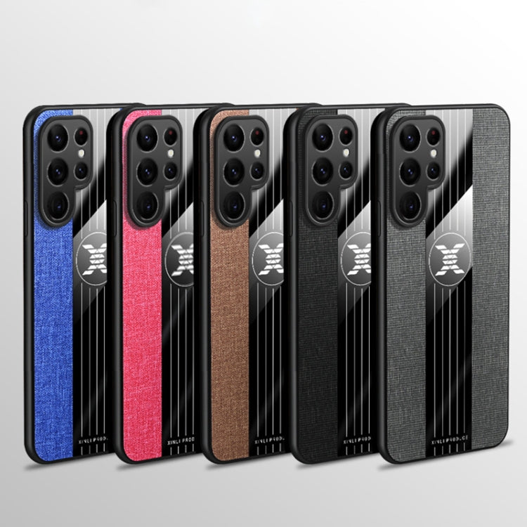 Para Samsung Galaxy S22 Ultra 5G XINLI Costura de tela Textura TPU Funda para teléfono con soporte para anillo (Negro)